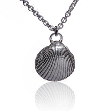 Load image into Gallery viewer, A beautiful sterling silver shell pendant, from Muirioch beach here in Kerry. One of my favourite beaches on the Dingle peninsula. This shell pendant is cast in sterling silver and features a beautiful natural texture. It sits beautifully on a thick sterling silver chain. It measures 20 inches in length and comes beautifully packaged in a branded gift box. Carry a small part of West Kerry wherever you go. Hallmarked in Dublin Castle. Designed & Handmade in Dingle