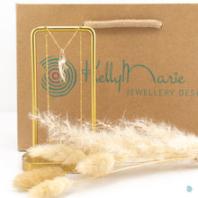 Load image into Gallery viewer, Natural Tusk Shell Pendant with Small Fresh Water Pearl and Gold Vermeil Coral Charm on a 14k Gold Filled Satellite Chain, 16 inches in length with a 2 inch extension chain. This piece comes presented in an eco friendly branded gift box for safe keeping. Designed and Handmade in Dingle