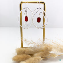 Load image into Gallery viewer, Summer Statement Hoops  Hand wrapped silver filled tubes, with gorgeous red Czech glass centre beads and sterling silver bead detail and ear wires.  These earrings are in drop length and come with  backs included, they are presented in a pretty gift box for safe keeping, or making them perfect for gift giving.

