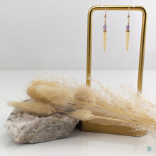 Load image into Gallery viewer, Natural tusk shell drop earrings. Simple and elegant earrings with a unique style, faceted light amethyst stones and 14k gold filled bead detail. These earrings come with backs included and are 3 cm in drop length from the base of the ear wires. They are presented in a branded gift box for safe keeping. Designed and Handmade in Dingle
