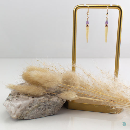 Natural tusk shell drop earrings. Simple and elegant earrings with a unique style, faceted light amethyst stones and 14k gold filled bead detail. These earrings come with backs included and are 3 cm in drop length from the base of the ear wires. They are presented in a branded gift box for safe keeping. Designed and Handmade in Dingle