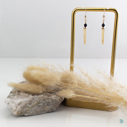 Simple drop earrings with natural shell, black onyx and 14k gold filled detail.  These earrings are 3 cm in drop length from the base of the ear wires and come with backs included.  They are presented in a pretty gift box for safe keeping.  Designed and Handmade in Dingle