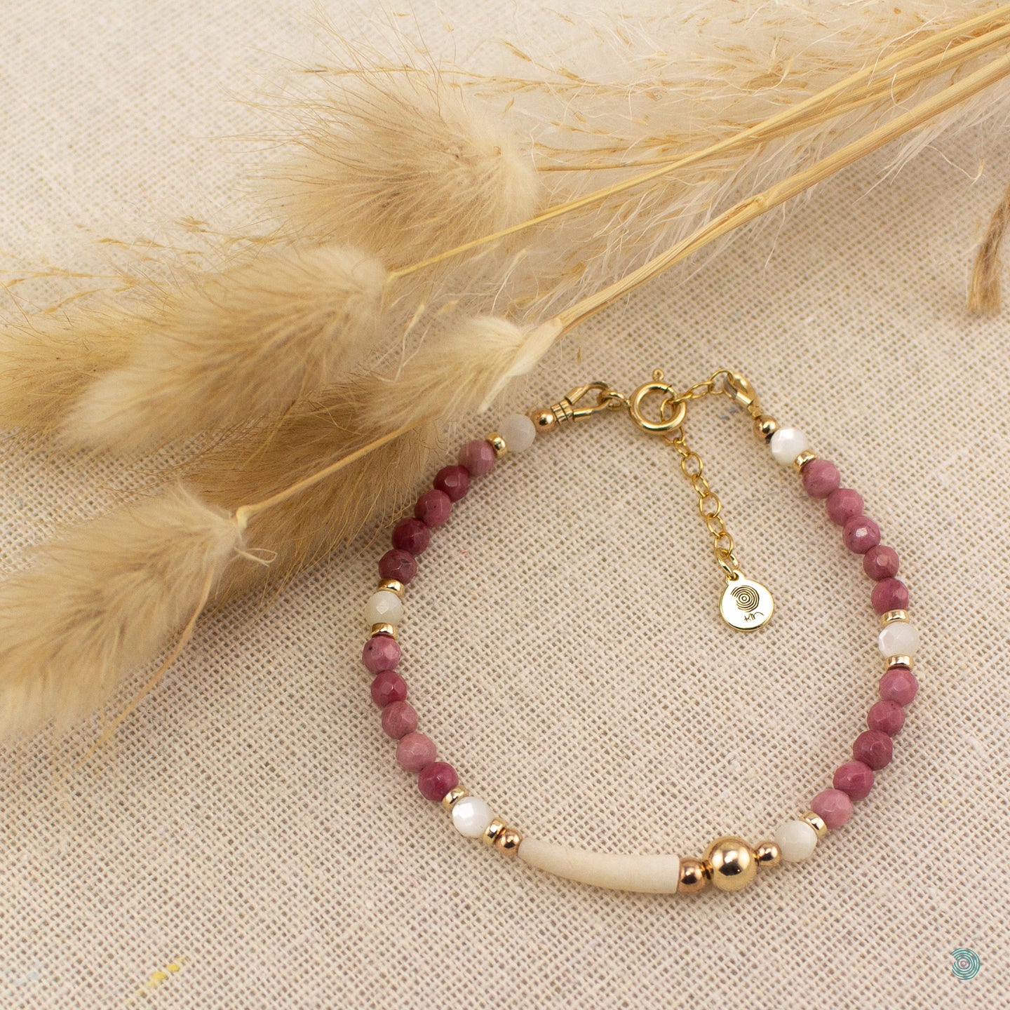 *One of a kind  Local, natural tusk shell necklace with pretty rhodonite, mother of pearl and 14k gold filled bead detail sitting on a gold filled chain.  This necklace is 18 inches in length with a 2 inch extension chain for adjustment.  It comes presented in a branded gift box for safe keeping or making it perfect for gift giving  Designed & Handmade in Dingle