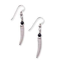 Load image into Gallery viewer, Simple natural Irish tusk shell drop earrings in a soft off white with small 4mm faceted black onyx stones and sterling silver beads.  These earrings are approximately 3.5cm in size and come with backs included. They are lightweight and easy to wear.  They come beautifully presented in an eco friendly branded gift box for safe keeping.  Designed and Handmade in Dingle. Due to the nature of the materials used, each pair is unique and will differ slightly from the image shown
