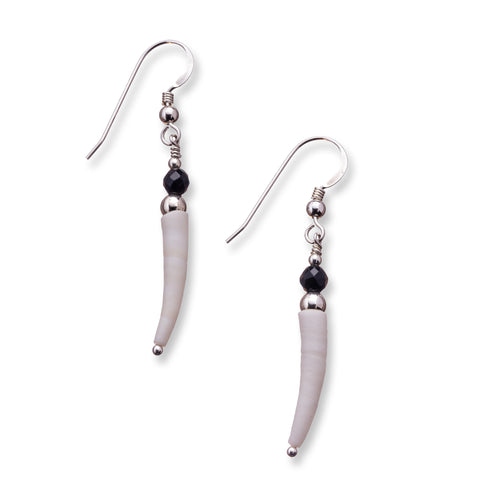 Simple natural Irish tusk shell drop earrings in a soft off white with small 4mm faceted black onyx stones and sterling silver beads.  These earrings are approximately 3.5cm in size and come with backs included. They are lightweight and easy to wear.  They come beautifully presented in an eco friendly branded gift box for safe keeping.  Designed and Handmade in Dingle. Due to the nature of the materials used, each pair is unique and will differ slightly from the image shown