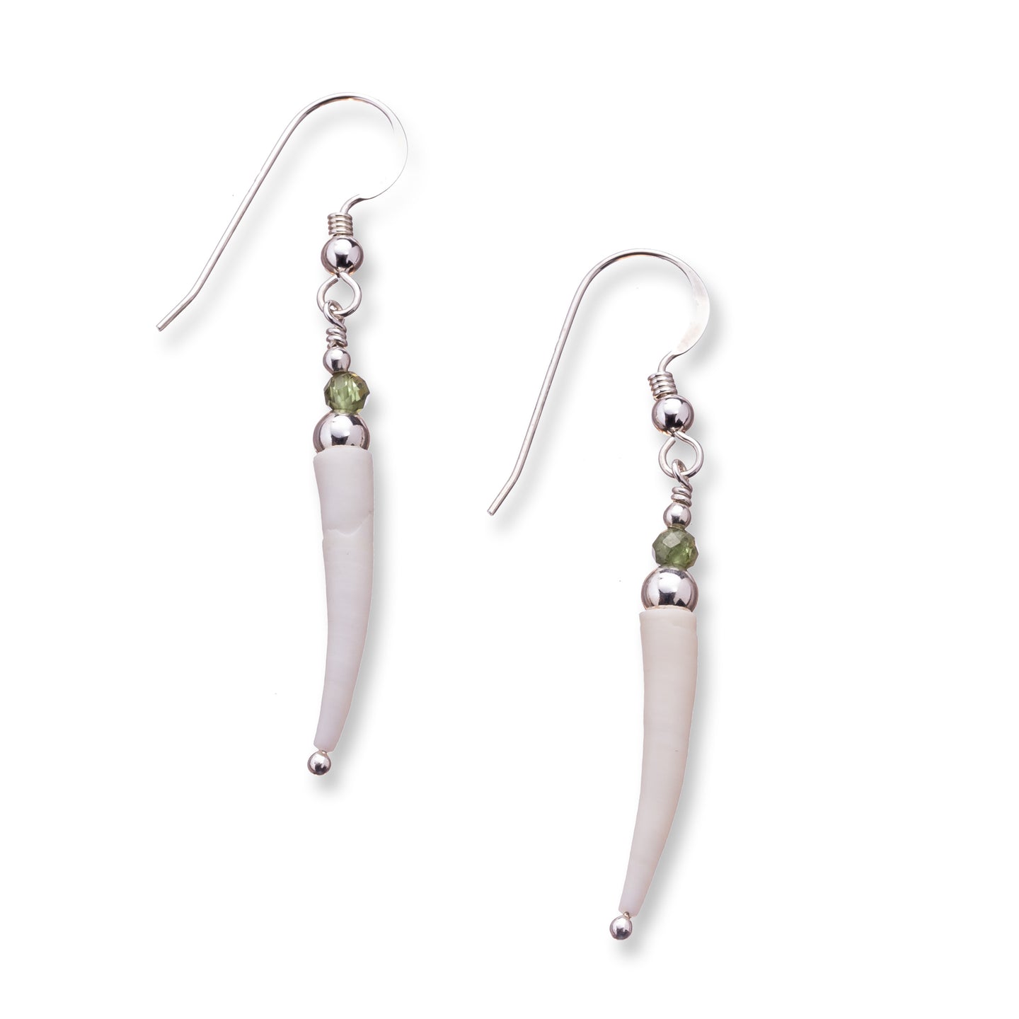 Simple natural Irish tusk shell drop earrings in a soft off white colour with small 3mm faceted peridot stones and sterling silver beads.  These earrings are approximately 3.5cm in size and come with backs included. They are lightweight and easy to wear.  They come beautifully presented in an eco friendly branded gift box for safe keeping.  Designed and Handmade in Dingle. Due to the nature of the materials used, each pair is unique and will differ slightly from the image shown