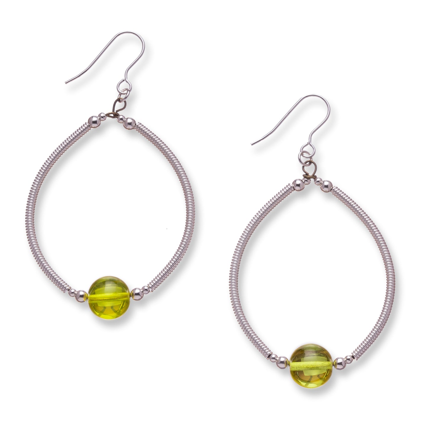Large hoops made from hand wrapped silver filled tubes, sterling silver beads and feature a gorgeous bright yellow transparent glass bead at the bottom centre of the hoop.  These earrings sit on sterling silver ear wires and and come with backs included. The drop length is 5cm and measured from the base of the ear wire.  They come beautfully presented in an eco friendly branded gift box for safe keeping. Designed & Handmade in Dingle