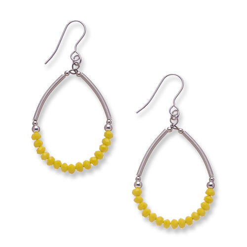 Crystal hoops made from hand wrapped silver filled tubes, small sterling silver beads and feature faceted bright yellow crystal glass beads in a semi circle.  These earrings sit on sterling silver ear wires and come with backs included. The drop length is 4cm and measured from the base of the ear wire. They come beautifully presented in an eco friendly branded gift box for safe keeping.  Designed and Handmade in Dingle
