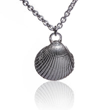 Load image into Gallery viewer, A beautiful sterling silver shell pendant, from Muirioch beach here in Kerry.  One of my favourite beaches on the Dingle peninsula.  This shell pendant is cast in sterling silver and features a beautiful natural texture.  It sits beautifully on a thick sterling silver chain. It measures 20 inches in length and comes beautifully packaged in a branded gift box.  Carry a small part of West Kerry wherever you go.  Hallmarked in Dublin Castle.  Designed &amp; Handmade in Dingle
