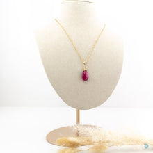 Load image into Gallery viewer, Beautiful, simple style, faceted ruby red teardrop pendant, wrapped in a 14k gold filled nest that sits on a gold filled chain. 18inches in length with a 2 inch extension chain for adjustment. Designed and Handmade in Dingle.
