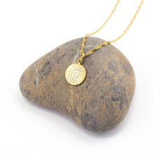 Load image into Gallery viewer, Gold plated stainless steel small disc sun charm pendant on a gold plated stainless steel woven style chain. Simple style that works well layered up with other pieces as well as by itself. 
