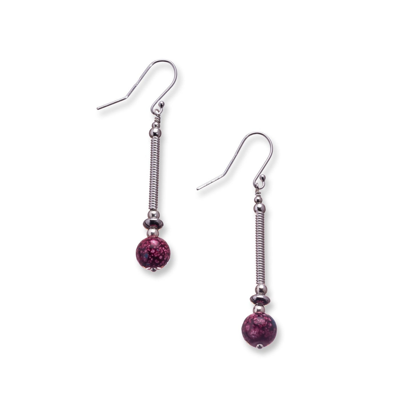 Silver filled drops with deep red spotted glass beads, sterling silver beads and stainless steel flat beads. These earrings sit on sterling silver ear wires and come with backs included. The drop length of these earrings is 4cm and measured from the base of the ear wire. They come in beautifully presented in an eco friendly branded gift box for safe keeping. Designed & Handmade in Dingle