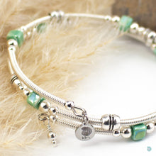Load image into Gallery viewer, Hand wrapped silver filled wrap around bracelet, green ceramic cubes and silver bead detail. Approximate diameter is 6cm and is flexible to fit most wrist sizes. This bracelet has no clasp is simply wraps around the wrist and sits in place. Designed and Handmade in Dingle, Ireland. KellyMarie Jewellery Design
