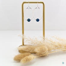 Load image into Gallery viewer, Hand wrapped silver filled hoops with glass bead centre in three colour choices, sterling silver bead detail and ear wires.  These earrings are 3.5cm in drop length from the base of the ear wires and come with backs included.  They are presented in a pretty gift pouch for safe keeping or making them perfect for gift giving.  Blue/Green Mix

