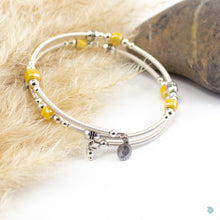 Load image into Gallery viewer, Hand wrapped silver filled wrap around bracelet, yellow ceramic cubes and silver bead detail. Approximate diameter is 6cm and is flexible to fit most wrist sizes. This bracelet has no clasp is simply wraps around the wrist and sits in place. Designed and Handmade in Dingle, Ireland. KellyMarie Jewellery Design
