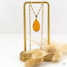 Load image into Gallery viewer, Simple and vibrant yellow jade teardrop pendant. This piece is 18 inches in length and sits on a gold plated stainless steel woven style chain.  It comes presented in a pretty gift box for safe keeping or making it perfect for gift giving  Designed and Made in Dingle
